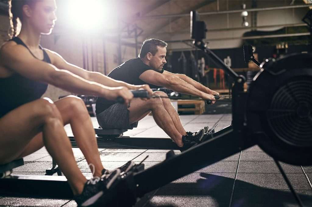 A rowing machine set up for a full-body cardio workout at home